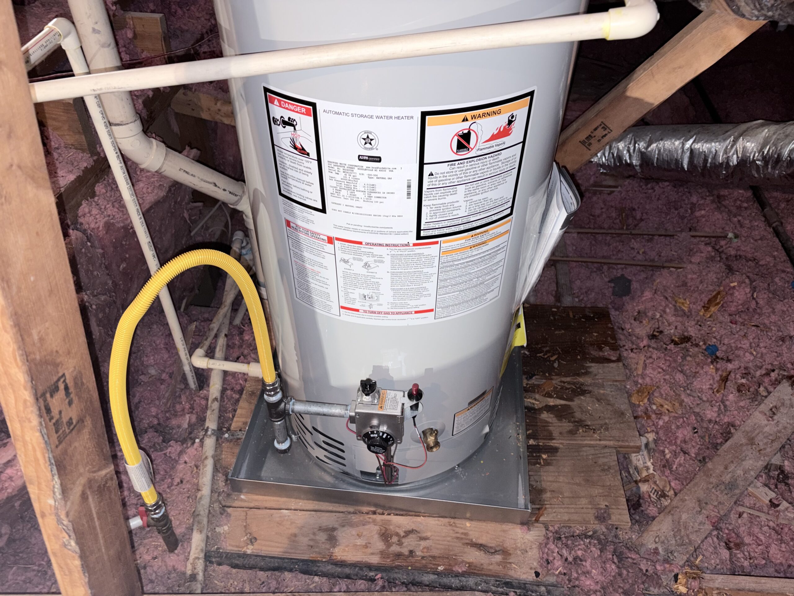 Brand new Bradford White natural gas water heater installed by Bear’s Plumbing in Spring, Texas for reliable hot water.