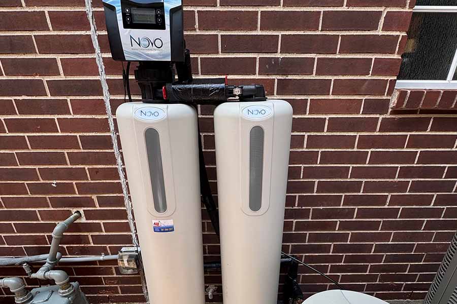 Dual-tank whole-home water filtration system professionally installed