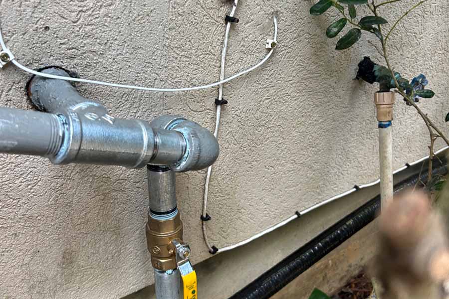 Gas line connections and shutoff valve installed outside a Spring, TX home