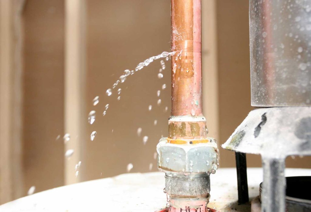 Damaged copper water line requiring plumbing repair